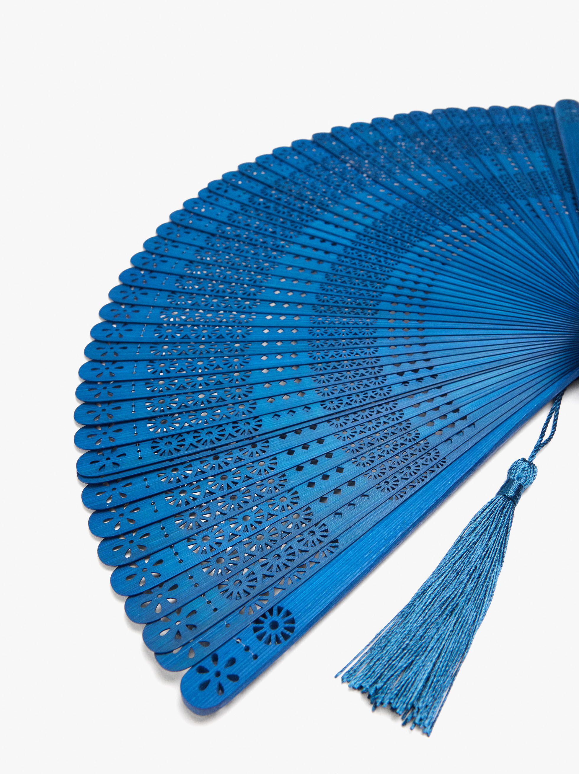 Bamboo fan with perforations