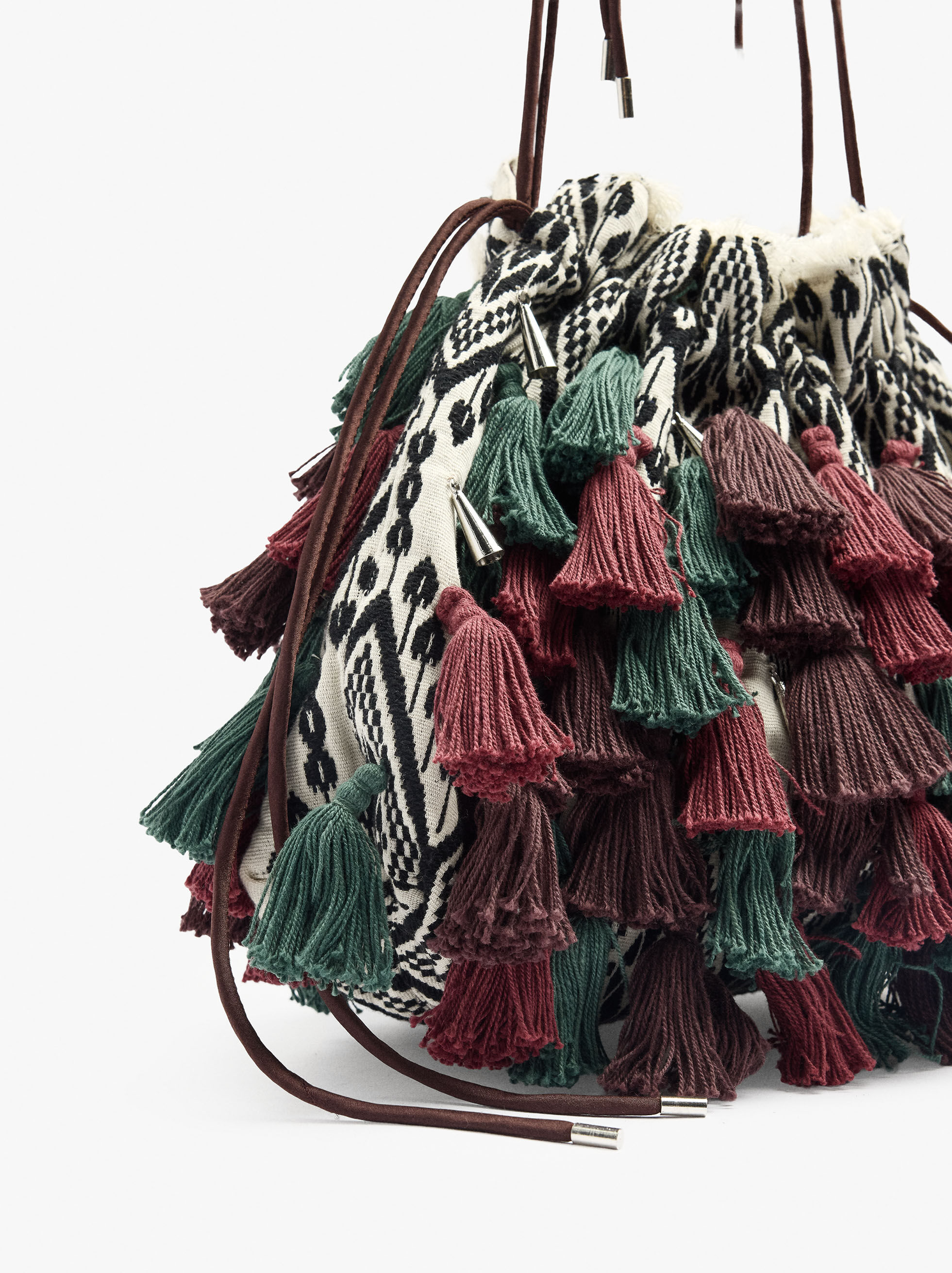 Party bag made of fabric with tassels