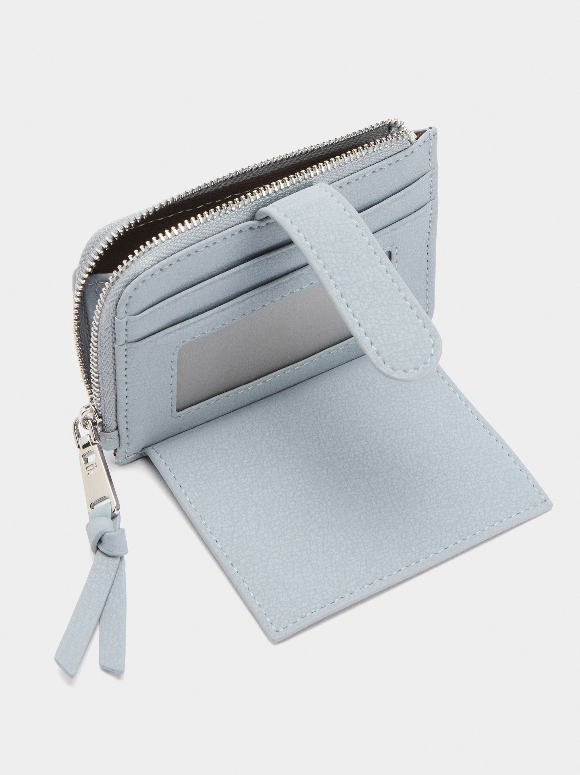 Card holder with texture and flap