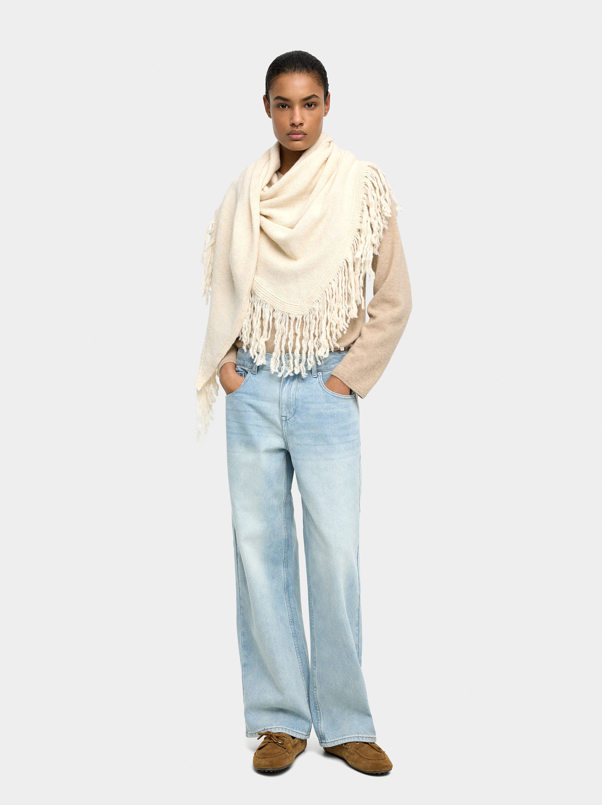 Distressed denim jeans
