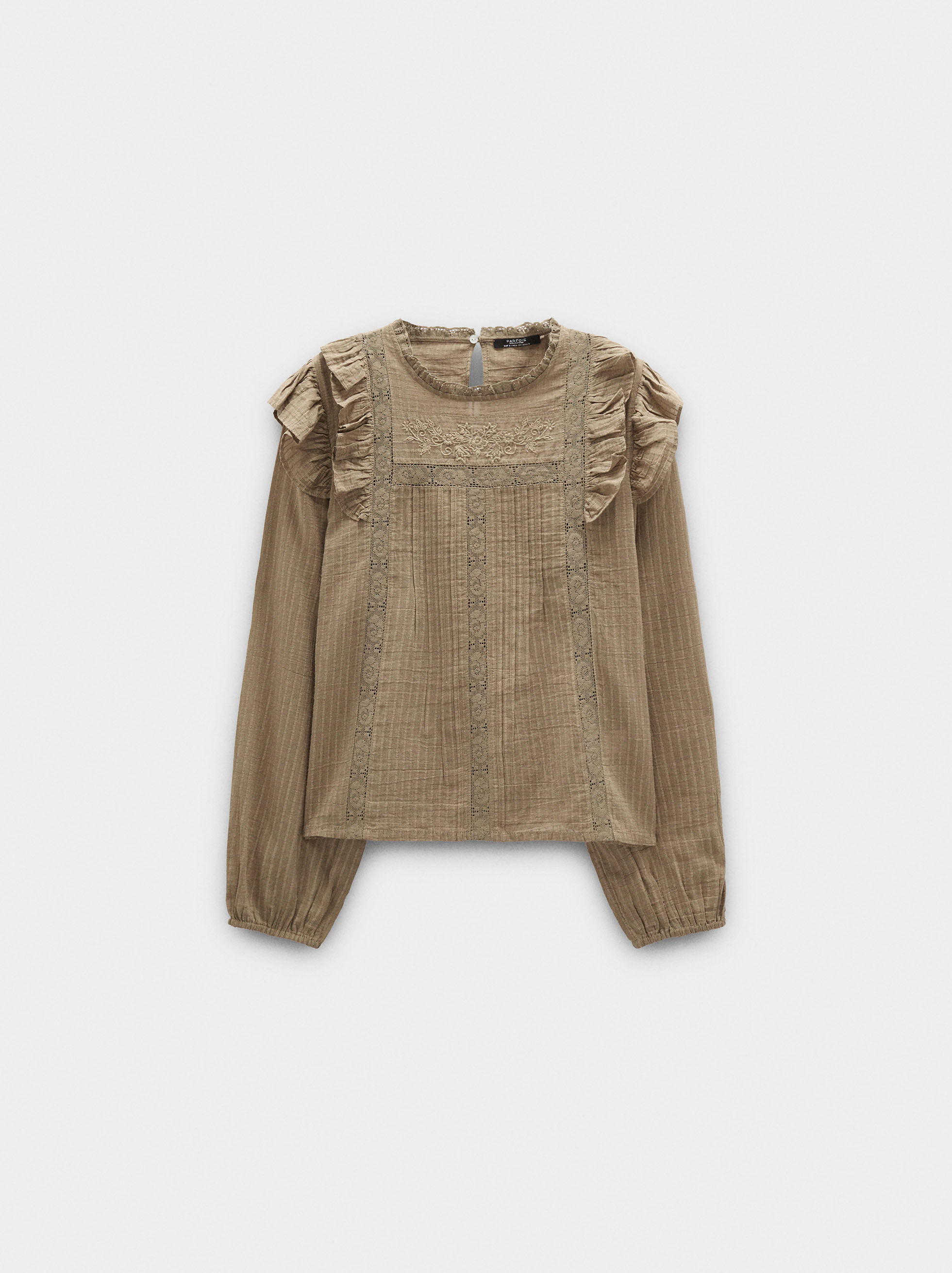 Embroidered and ruffled blouse